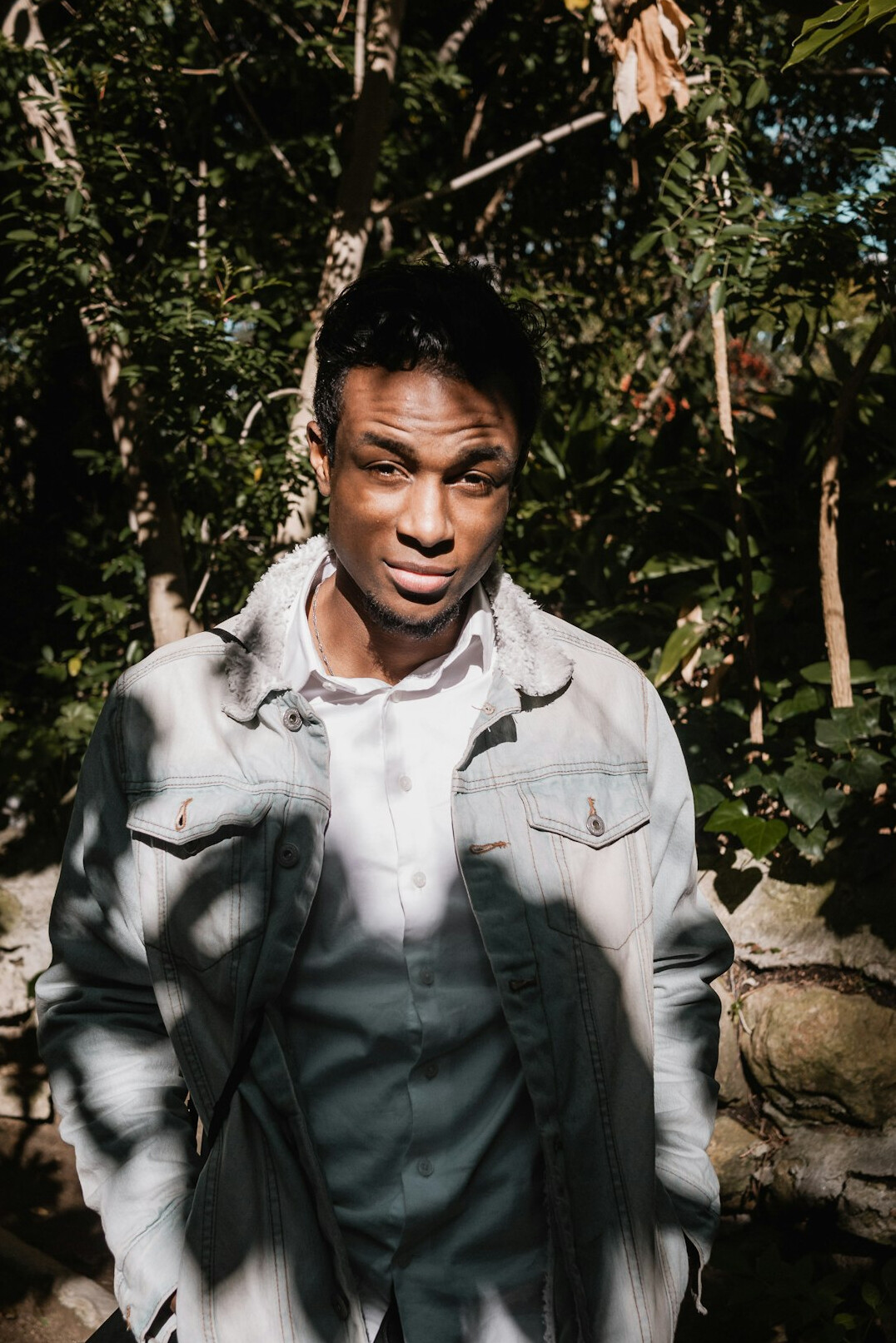 Portrait of a man in a shirt looking at the camera