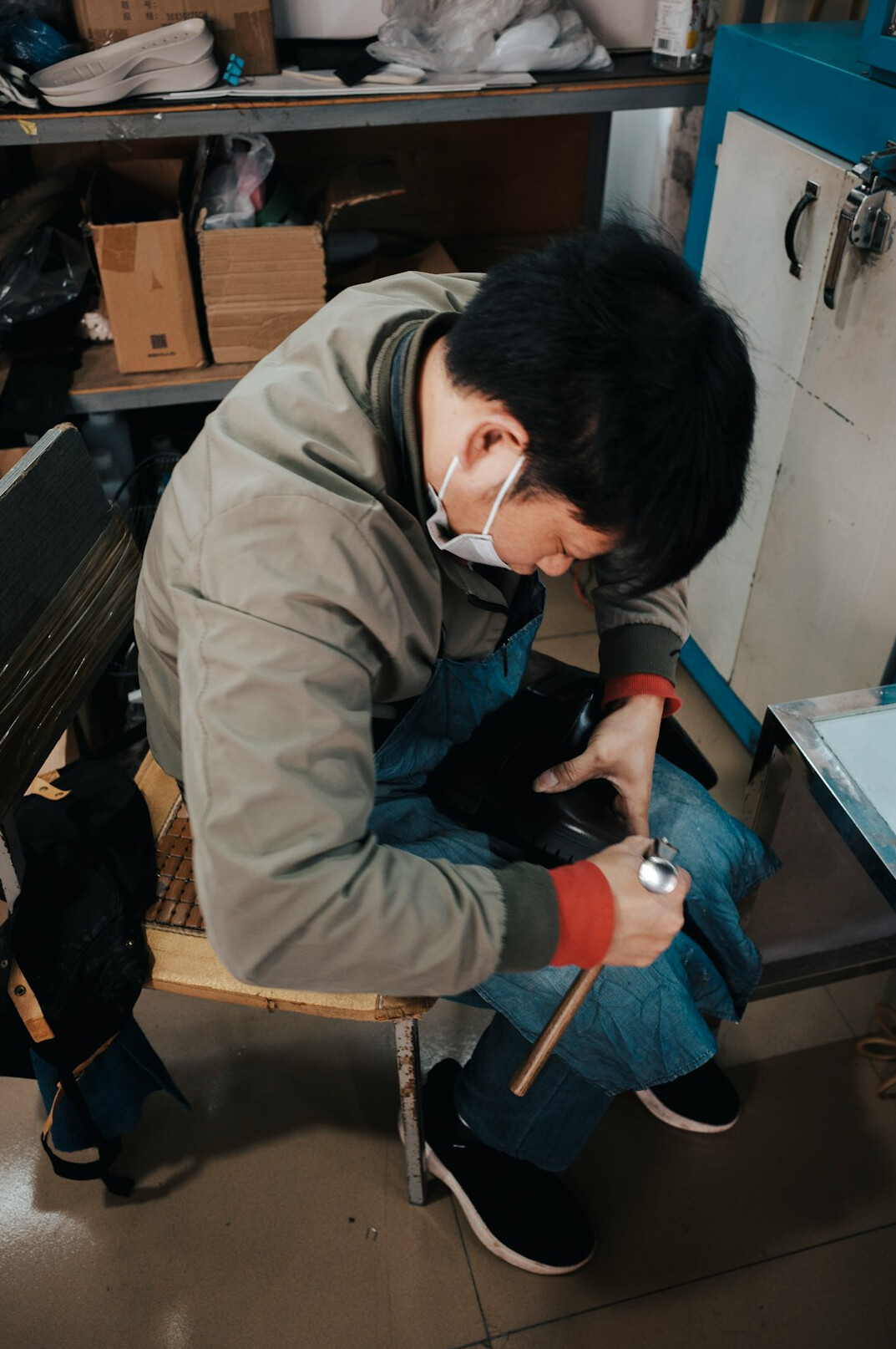 Person reviewing and signing official documents at a desk